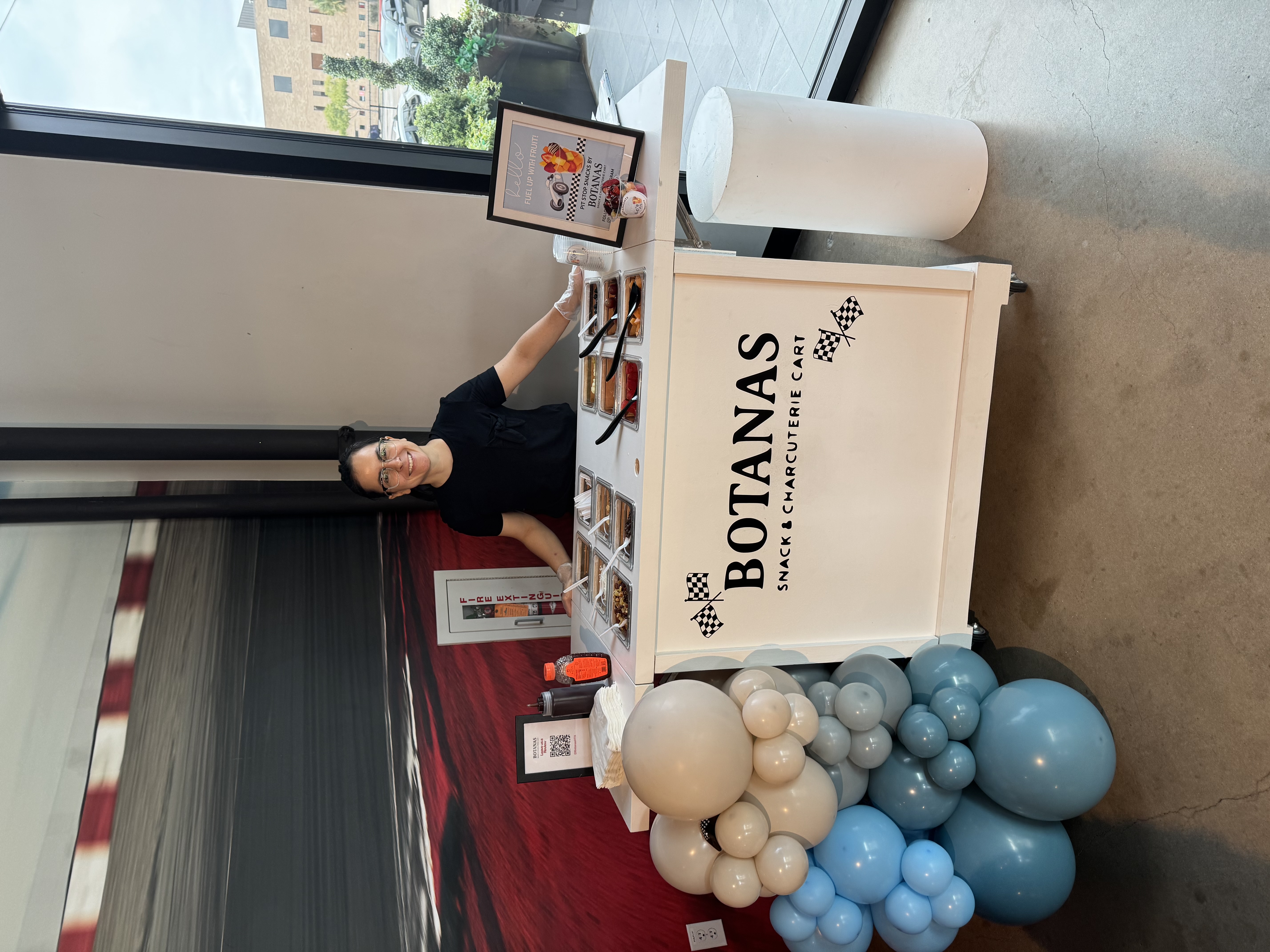 Botanas snack cart setup with umbrella at Houston private event